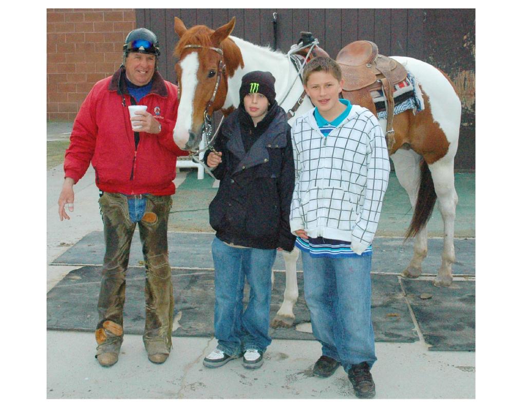 Dad Billy, Taylor and brother Timy with their pinto Bear. (Courtesy of Vicky Baze)